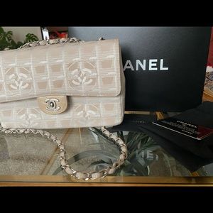 Chanel travel line beige bag